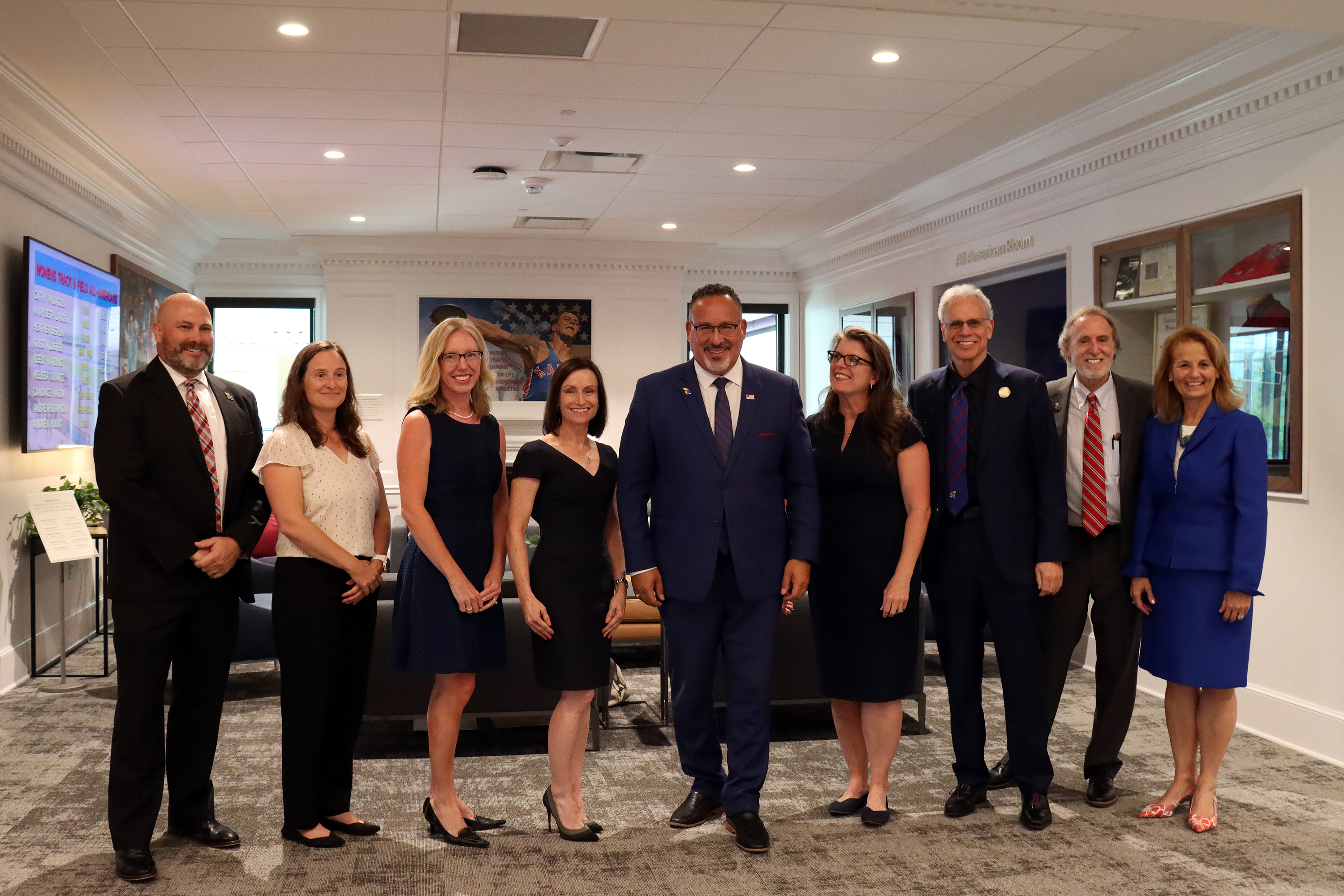 U.S. Secretary of Education Miguel Cardona poses for a photo with AAI and School of Education and Human Sciences researchers.